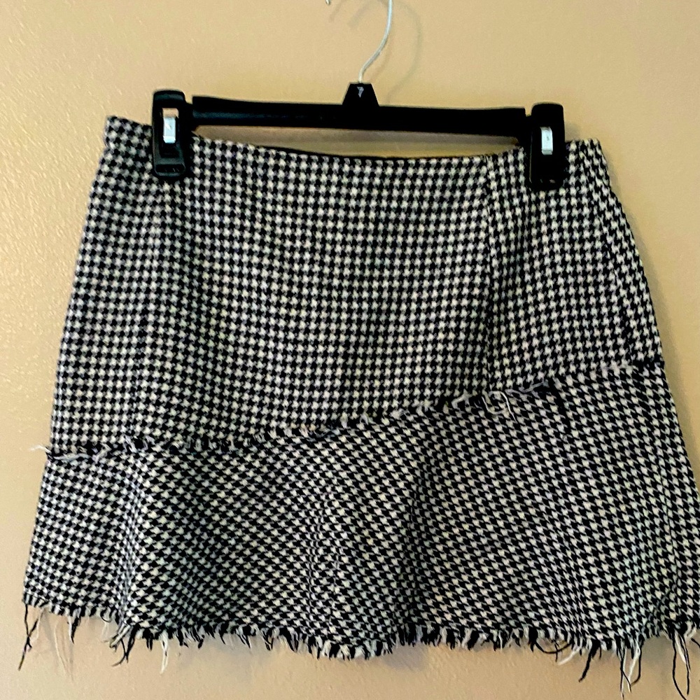Black and white short skirt with fringes
